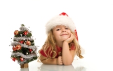 圣诞女孩趴着的可爱圣诞小女孩图片